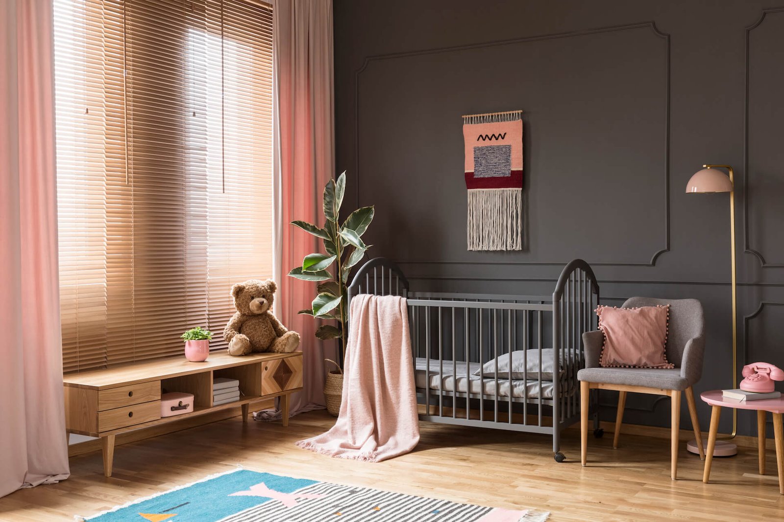 plush-toy-on-wooden-cupboard-next-to-grey-cradle-i-2021-08-26-15-43-06-utc.jpg