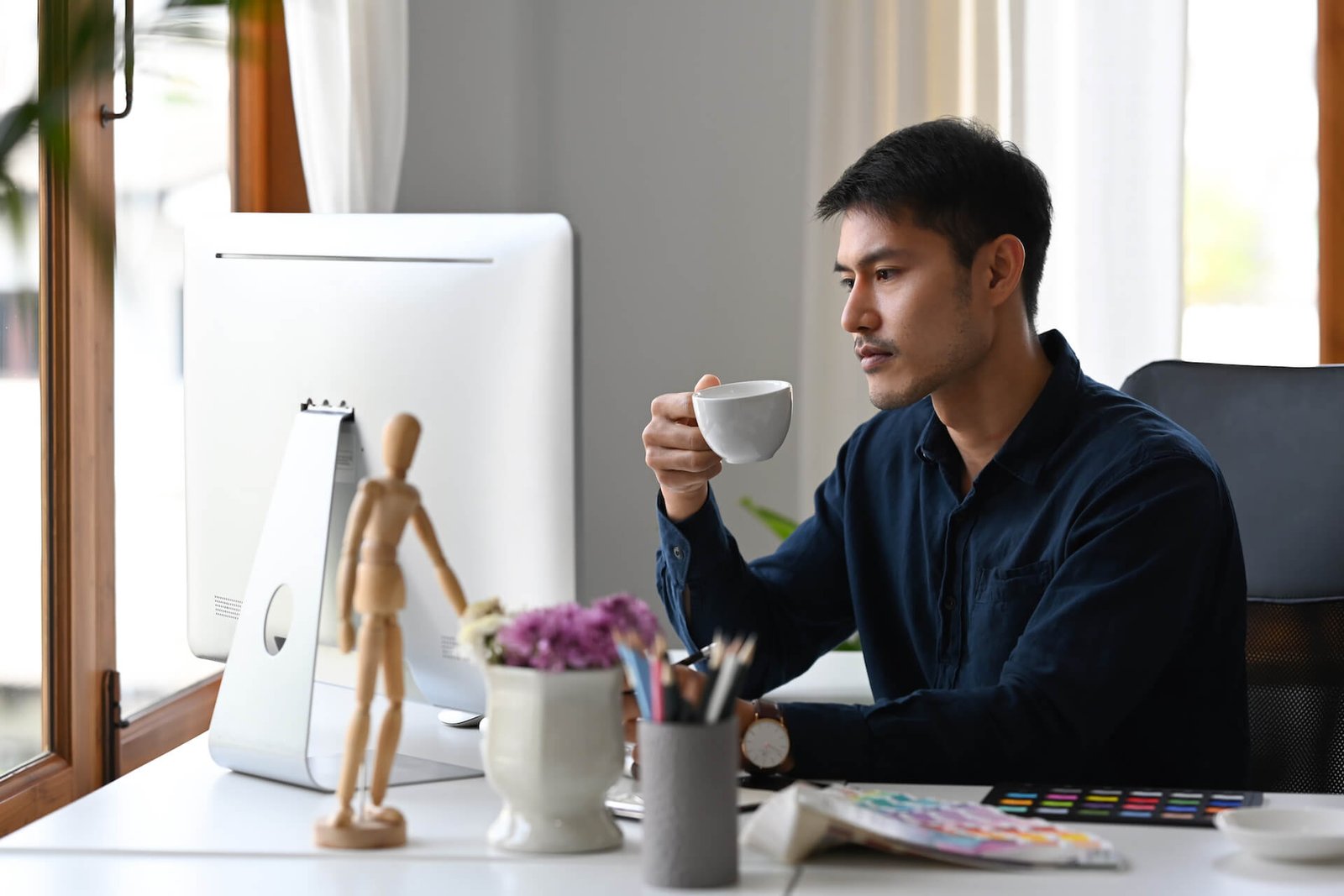 thoughtful-young-man-interior-designer-working-at-2022-04-07-00-39-20-utc.jpg